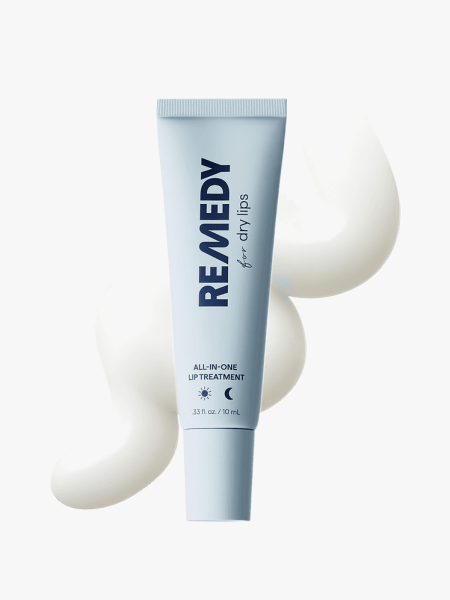 Hydrating and Healing Lip Balm Ointment in branded blue tube with cap atop product swatch on light gray background